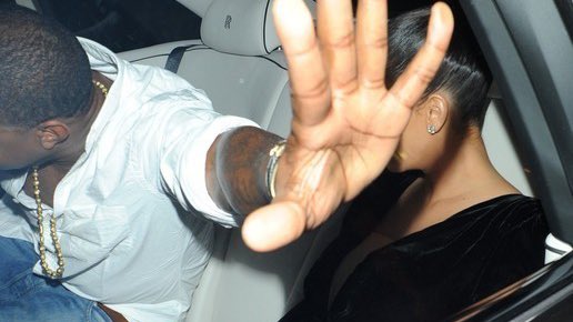 Kanye West and Kim Kardashian Getting Flashed by Paparazzi, Date Unknown